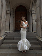 Ivory V-Neck Mermaid Dress with Voluminous Ruffle Hem