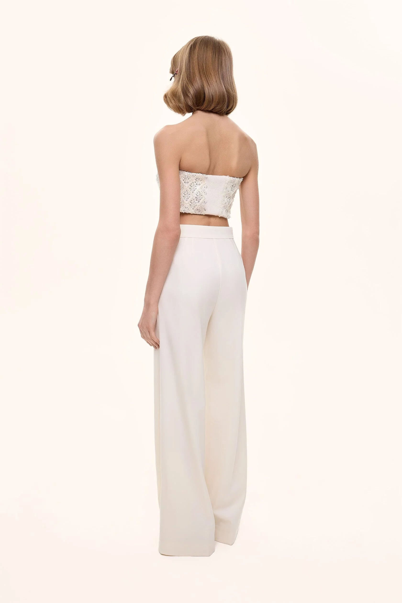 Bell-bottomed trousers with arrows