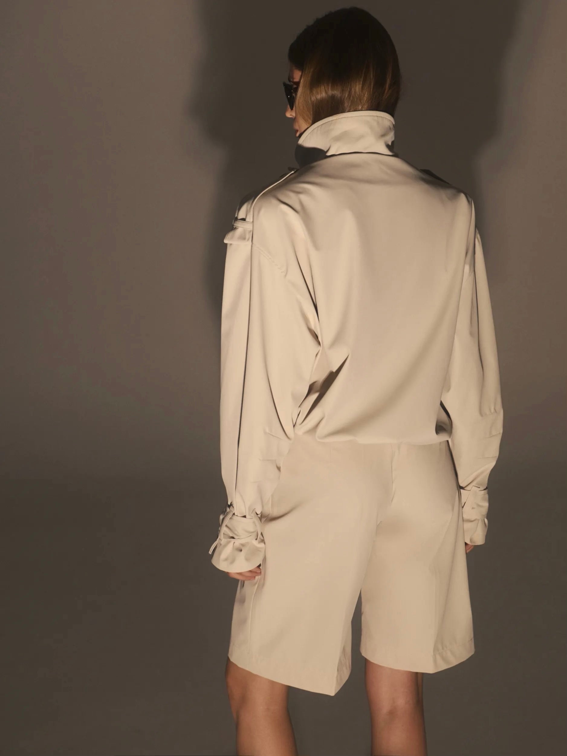 Bomber jacket with voluminous shoulders